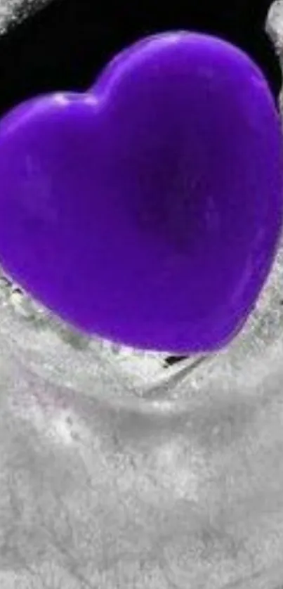 Vibrant purple heart on icy background.