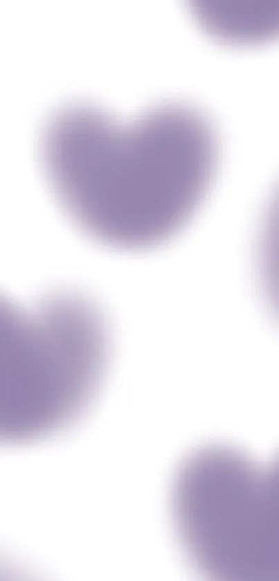 Blurred purple heart shapes on white background.