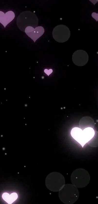 Black background with glowing purple hearts design.