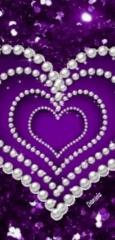 Purple heart with pearls phone wallpaper.