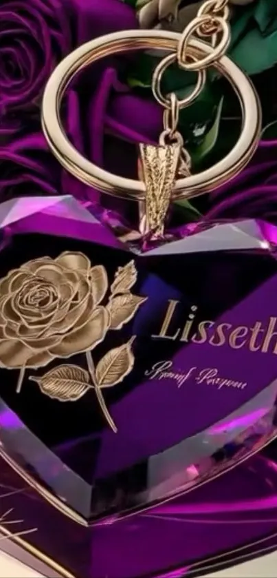 Purple heart keychain with rose engraving and gold accents.