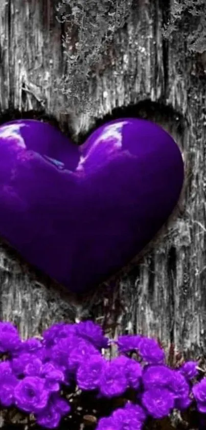 Purple heart embedded in tree with purple flowers in rustic setting.