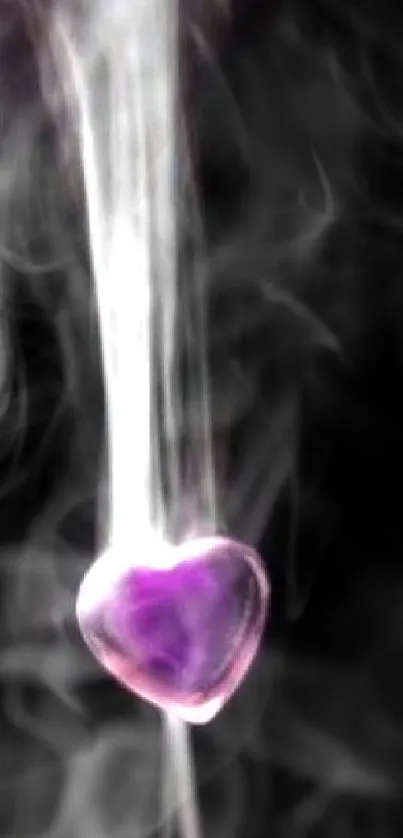 A mystical purple heart surrounded by ethereal smoke on a black background.