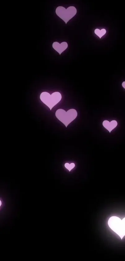 Romantic purple hearts on black background wallpaper.