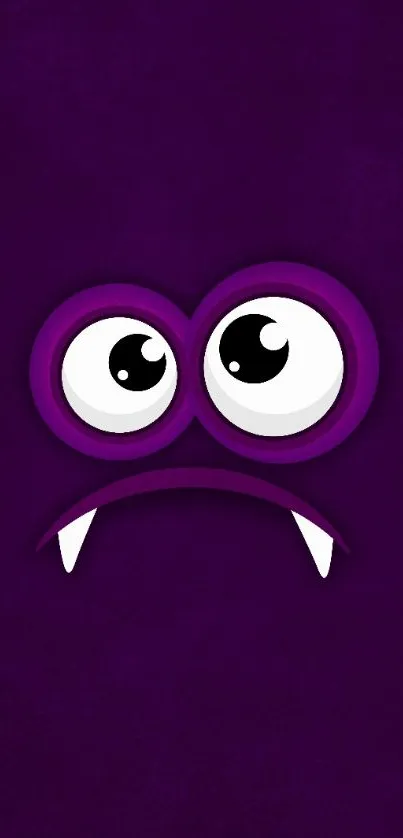 Whimsical purple monster wallpaper with cartoon eyes and playful expression.