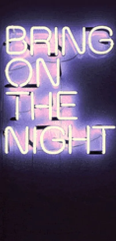 Purple neon sign with 'Bring On The Night' text on a dark background.