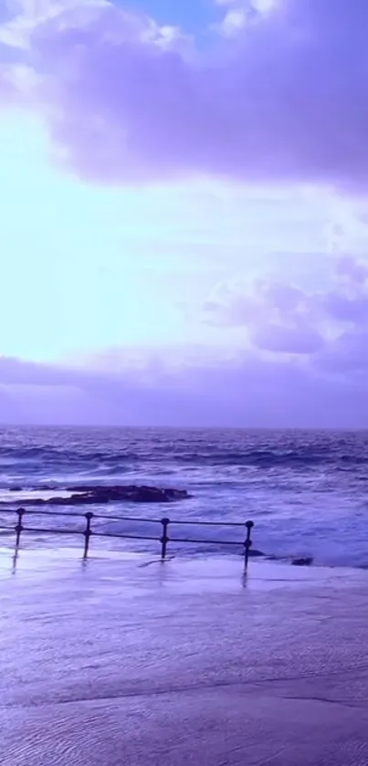 Serene purple ocean view at dusk with calming waters and clouds.