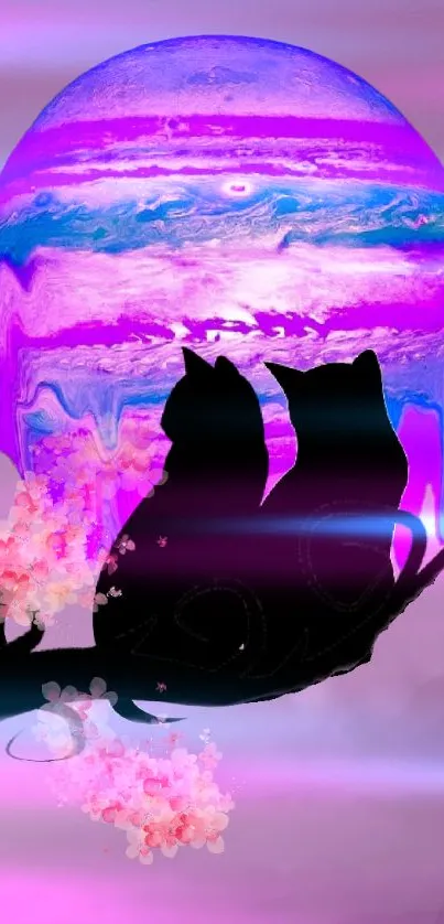 Cats silhouetted against purple planet with pink blossoms, artistic wallpaper.