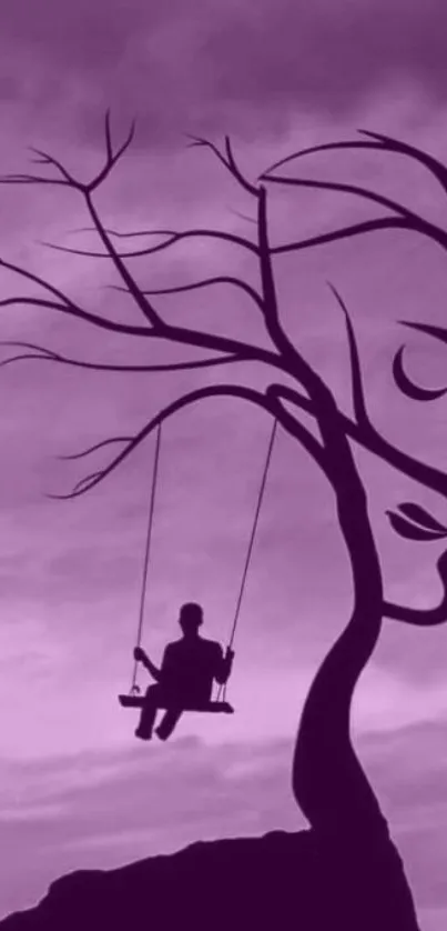 Purple tree-shaped silhouette with swing in dreamlike setting.