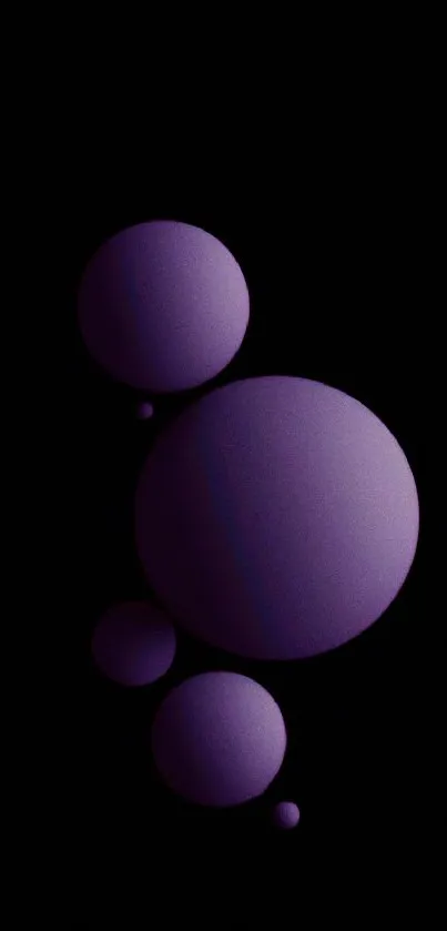 Purple spheres on a dark background creating a modern mobile wallpaper.