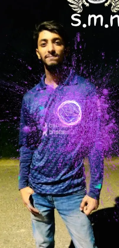 Young man with purple splash design on phone wallpaper.