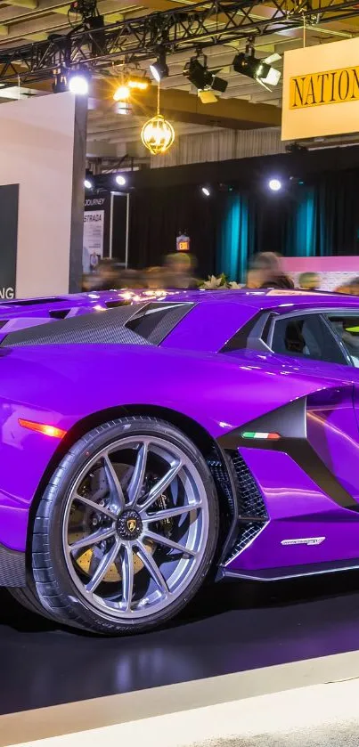 Purple sports car in a showroom setting.