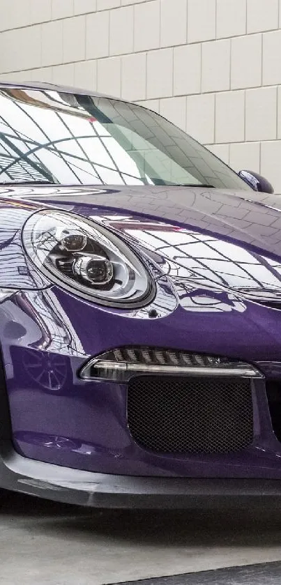 Purple sports car with sleek design, parked indoors.