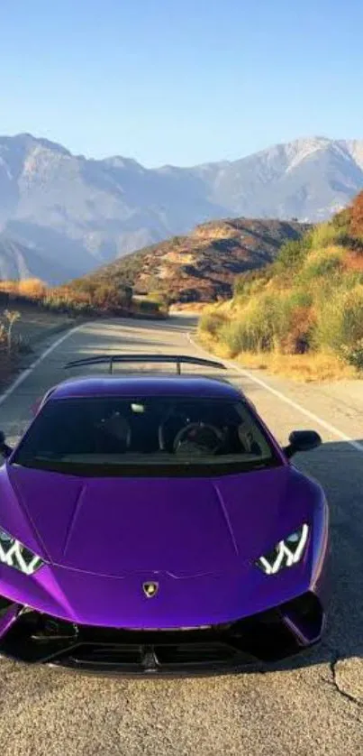 Purple sports car on scenic mountain road wallpaper.