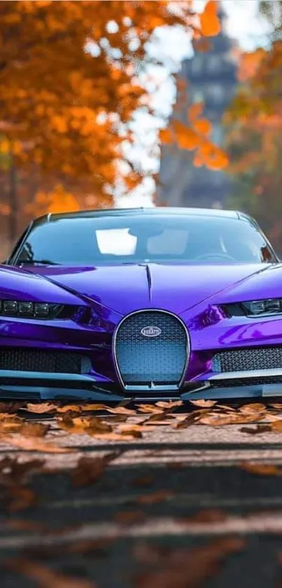 Purple supercar with autumn leaves background, highlighting luxury and nature.