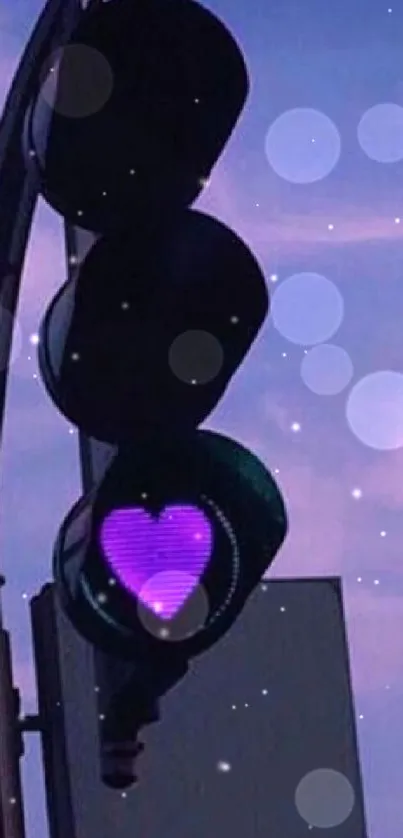 Traffic light silhouette against purple sky