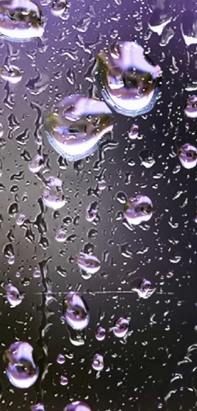 Purple water droplets on glass surface.