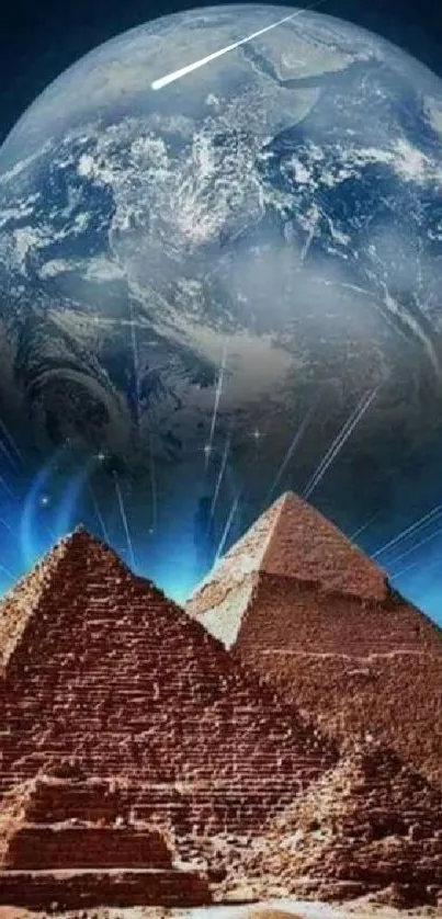 Pyramids against a cosmic Earth backdrop wallpaper.