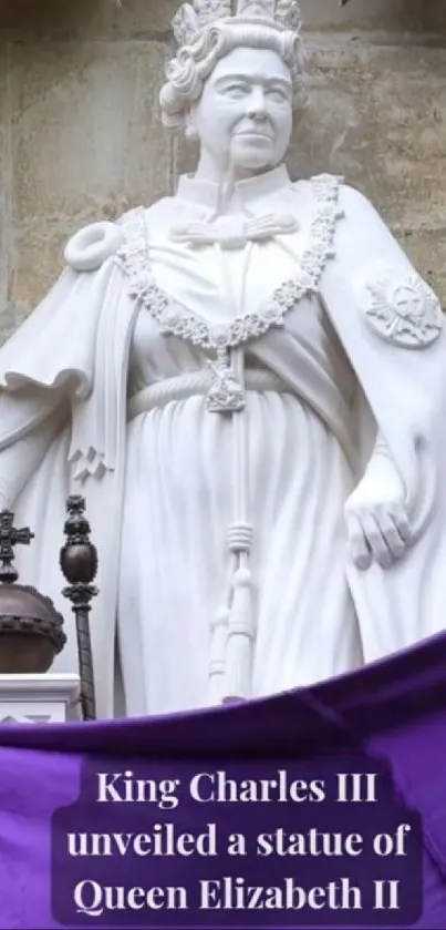 Statue of Queen Elizabeth II draped in purple cloth.