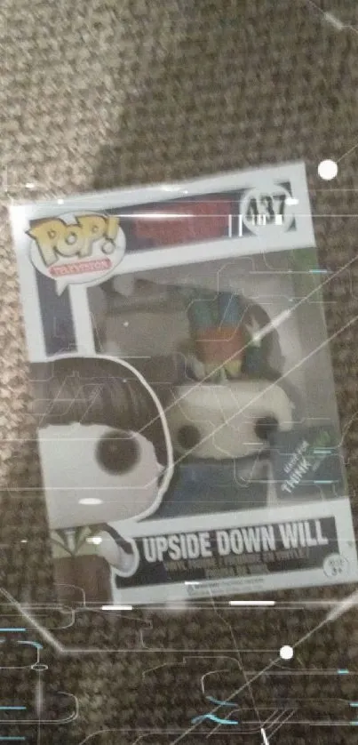 Boxed Pop figure with gray textured background.