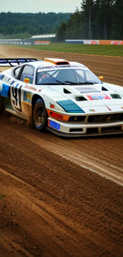 High-speed racing car on a dirt track kicking up dust.