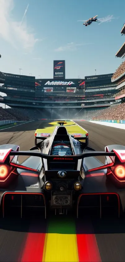 Racing car speeding down a vibrant track at the raceway with a clear sky above.