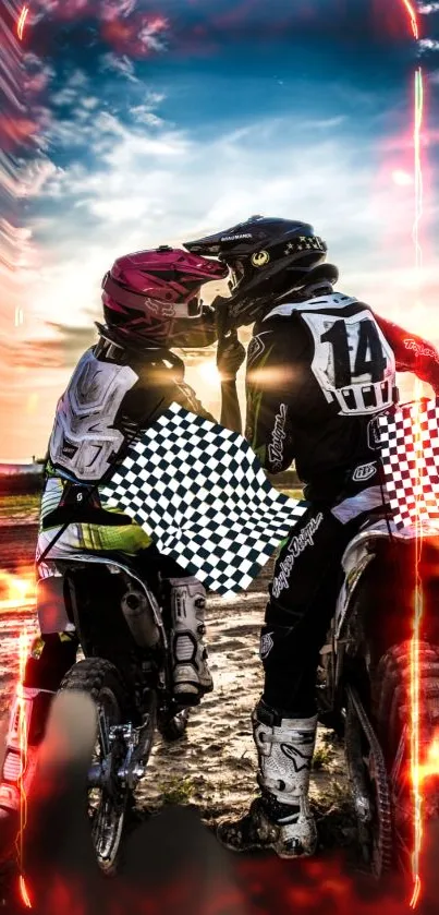 Motocross couple with sunset in fiery colors.