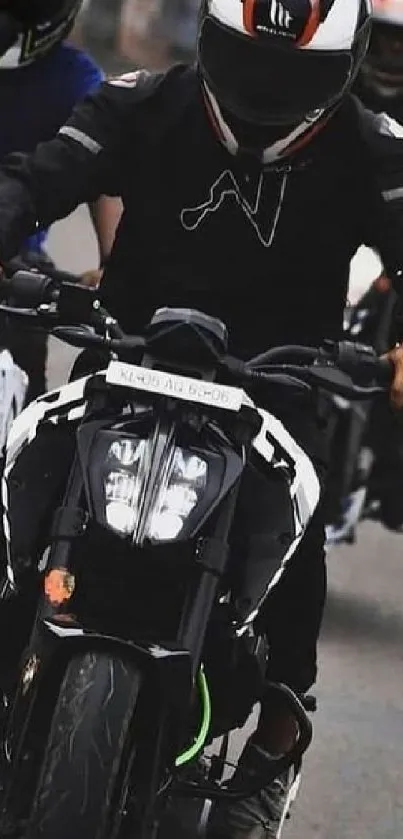 Racing motorcycle with rider in helmet on the road, captured dynamically.