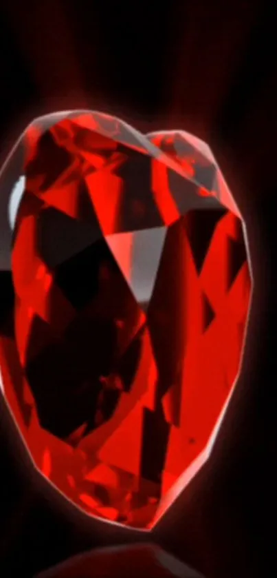 Red heart-shaped gem on black background.