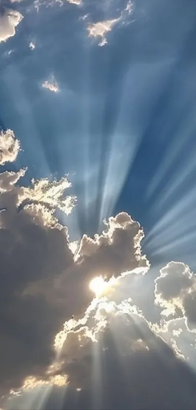 Sunlight streaming through clouds creating rays and a dramatic sky.