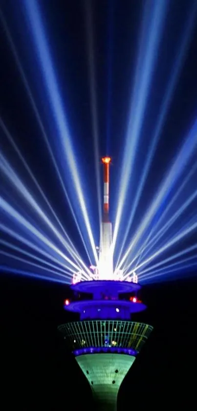 Dazzling tower with radiant light beams at night.