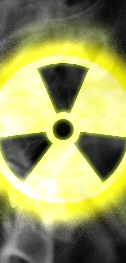 Glowing radiation symbol on a dark background.