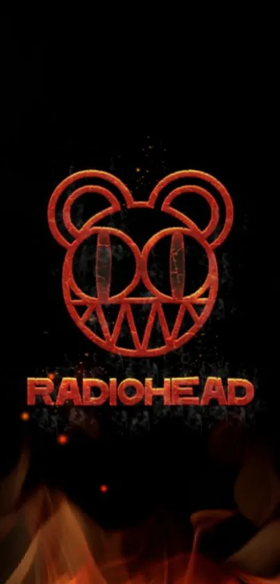 Radiohead red bear logo on black wallpaper.