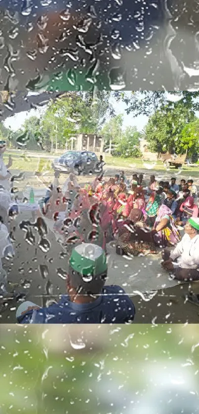 Community gathering seen through rain-kissed glass.