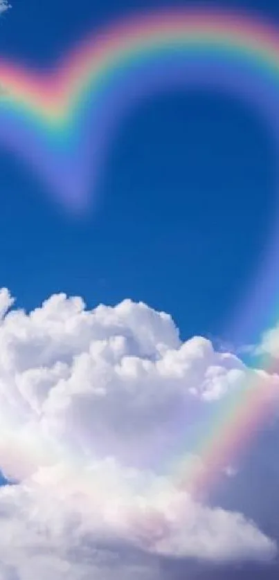 Rainbow heart in a vibrant blue sky with fluffy white clouds.