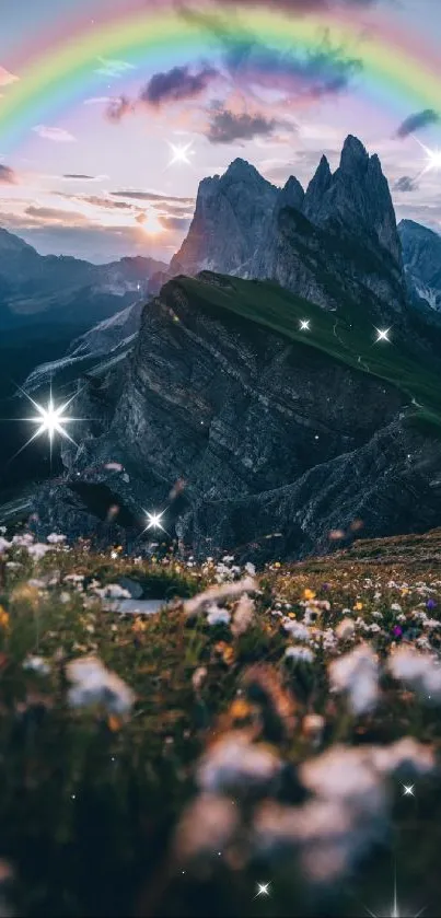 Mountain landscape with rainbow arc over peaks during sunset.