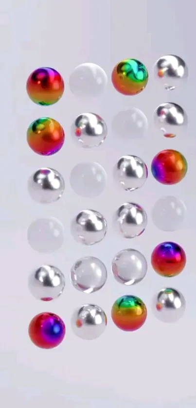 Colorful rainbow spheres with metallic finish on a silver background.