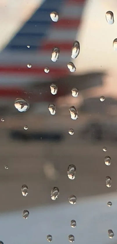 Raindrops on a window with a blurred airplane in the background.