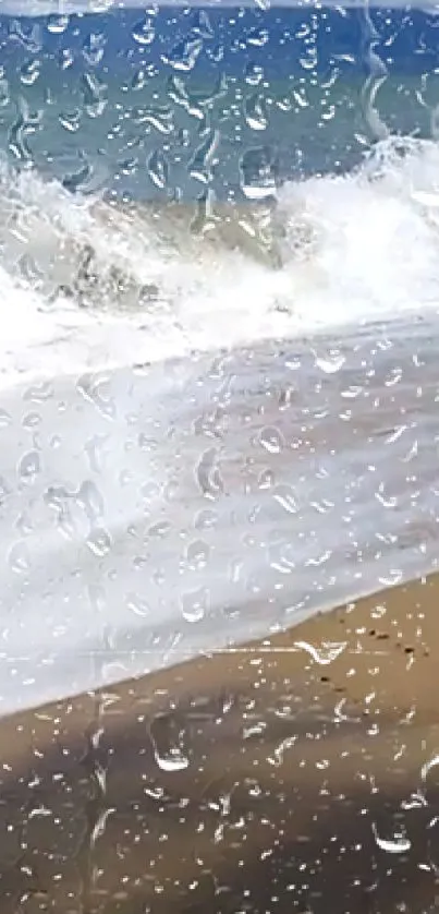 Raindrops on glass with beach waves in the background.