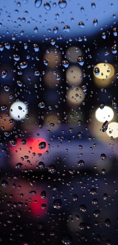 Glistening raindrops on a window with blurred city lights at night.