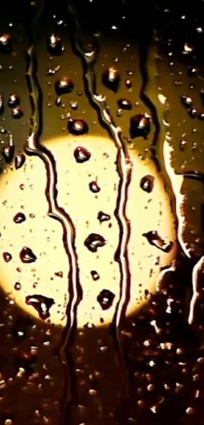 Artistic wallpaper with raindrops on glass, glowing against golden light.