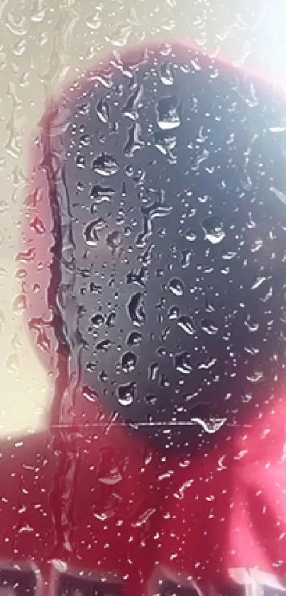 Hooded figure seen through rain-speckled glass in a red hue.