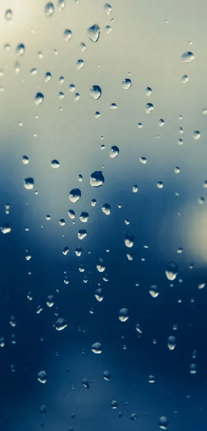 Moody wallpaper with raindrops on a glass window and a blurred backdrop.