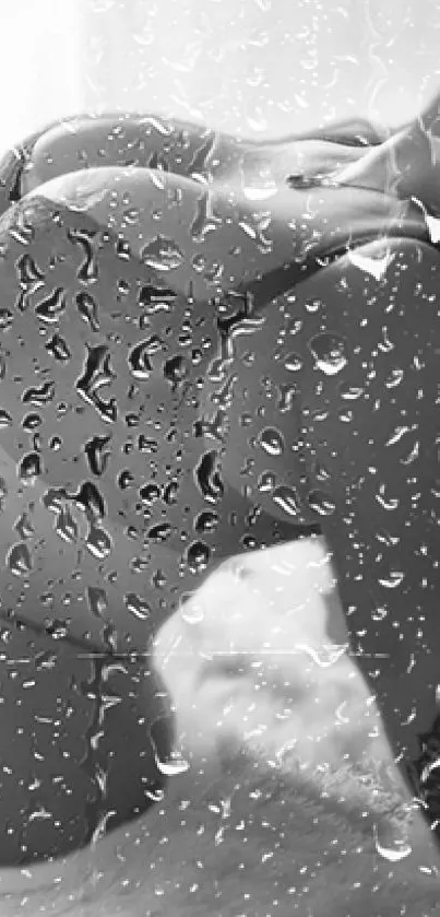 Grayscale abstract wallpaper with raindrop effect on glass.