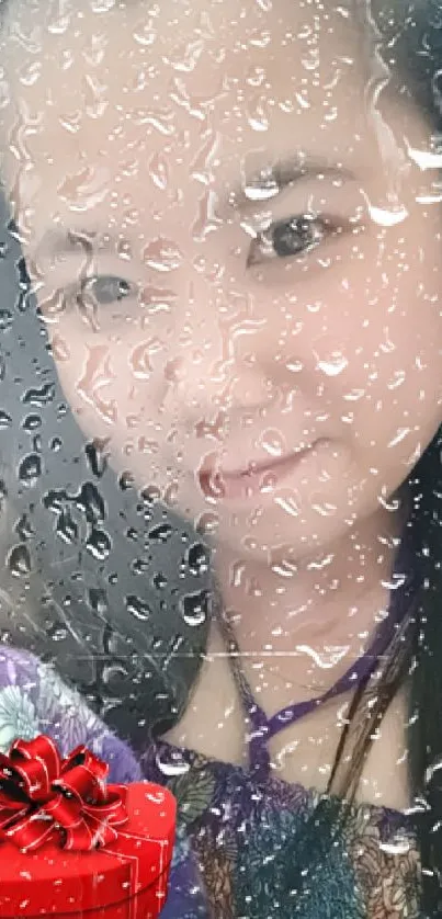 Raindrop-covered window with a woman's portrait.