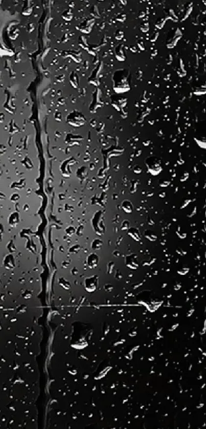 Mobile wallpaper with glistening raindrops on a dark reflective surface.