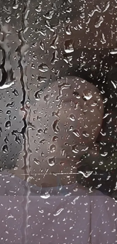 Raindrops on a window creating a calming, reflective phone wallpaper.