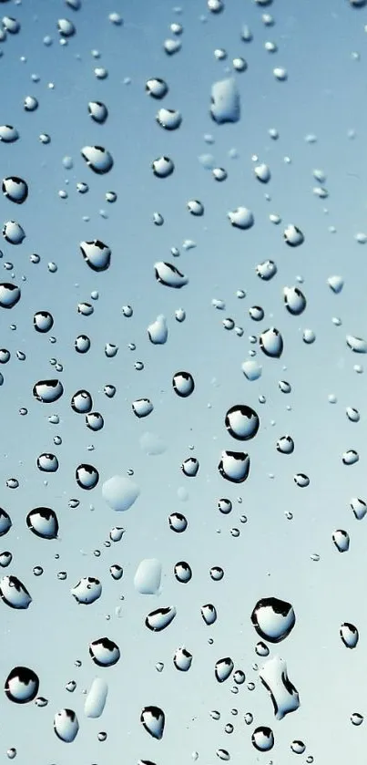 Raindrops on a soothing sky blue gradient background.