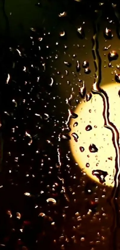 Raindrops on a window with a warm glowing light in the background.