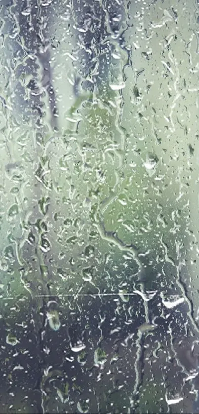 Raindrops streaming on a glass surface, creating a calming effect.